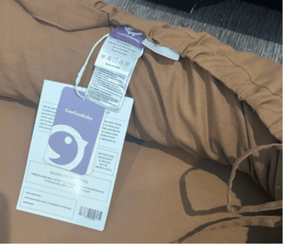 Tags showing "CooCooBaby" and the manufacturing information