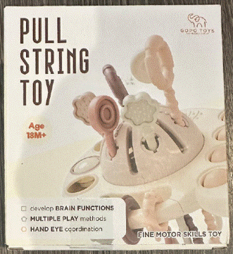 "GOPO TOYS" and "Pull String Toy" are printed on the front of the recalled teething toy packaging
