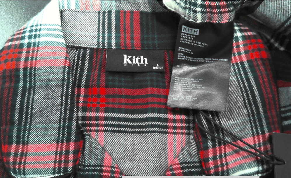 "Kith Kids" and the size are printed on the recalled pajama's neck label