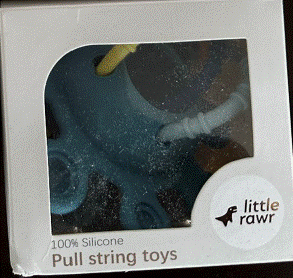 Recalled Little Rawr Silicone Pull String Teething Toys- Front of packaging