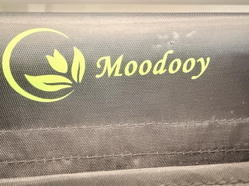 Moodooy brand name on the storage pocket