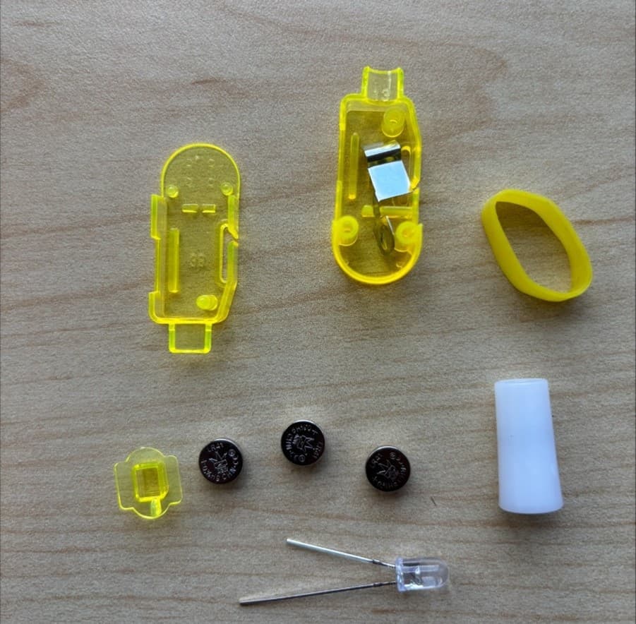 Recalled POPOOO finger lights have three internal button cell batteries that power Jungle Safari character projections