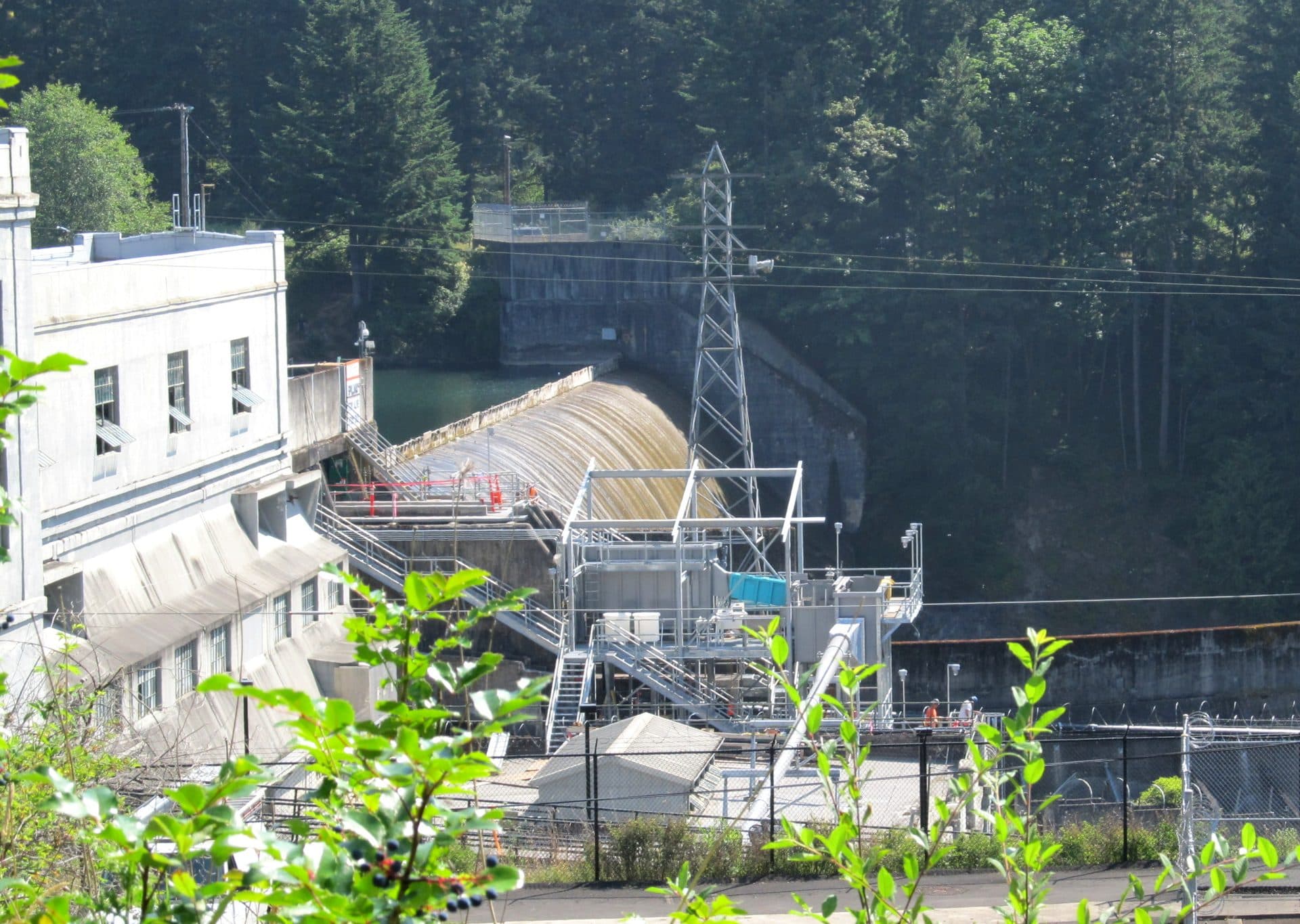 River Mill Dam on the Clackamas River near Estacada, Oregon — a Portland General Electric hydroelectric dam and powerhouse viewed from the east bank