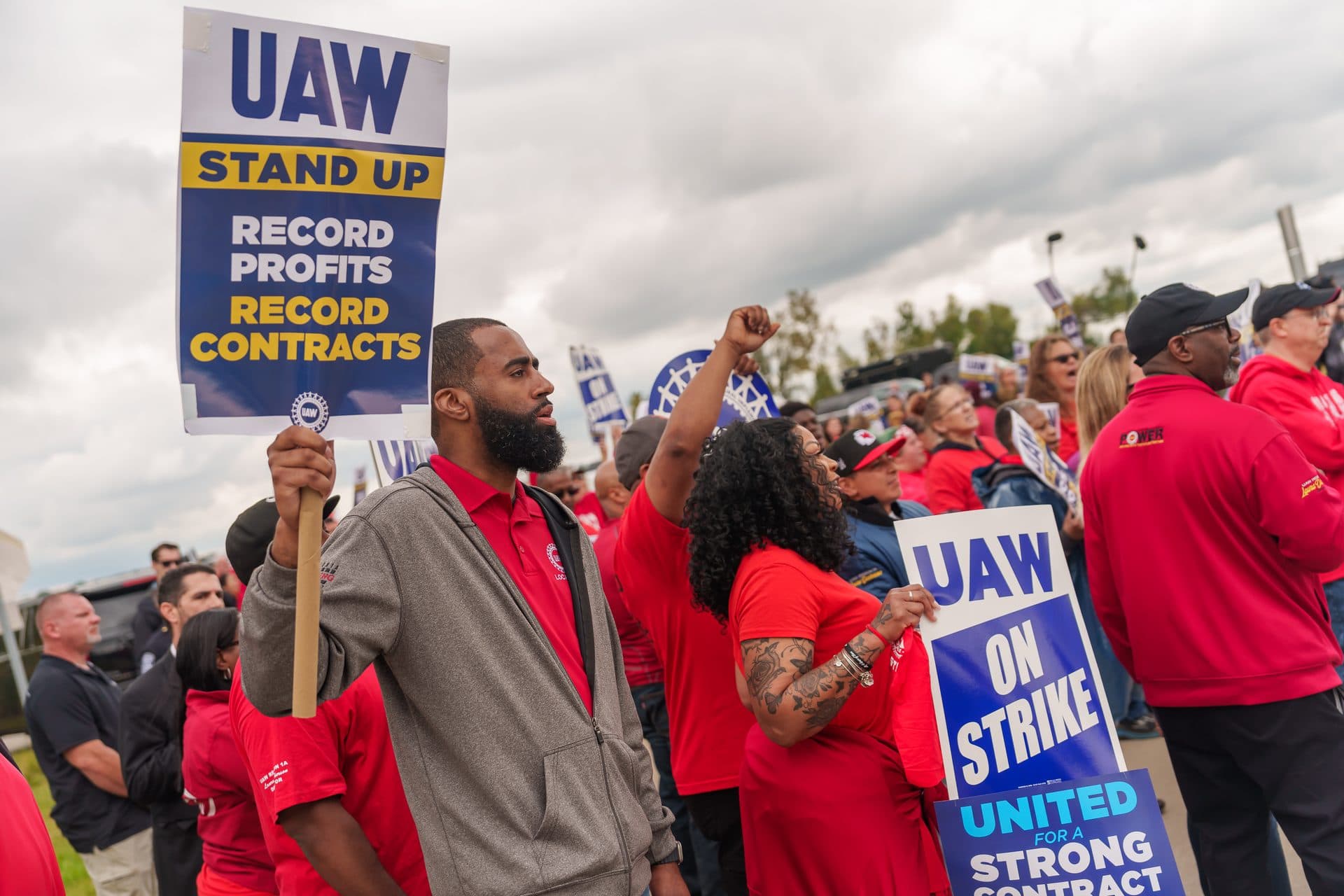 UAW workers holding picket signs on the picket line outside the GM Willow Run Distribution Center in Belleville, Michigan during the 2023 UAW strike