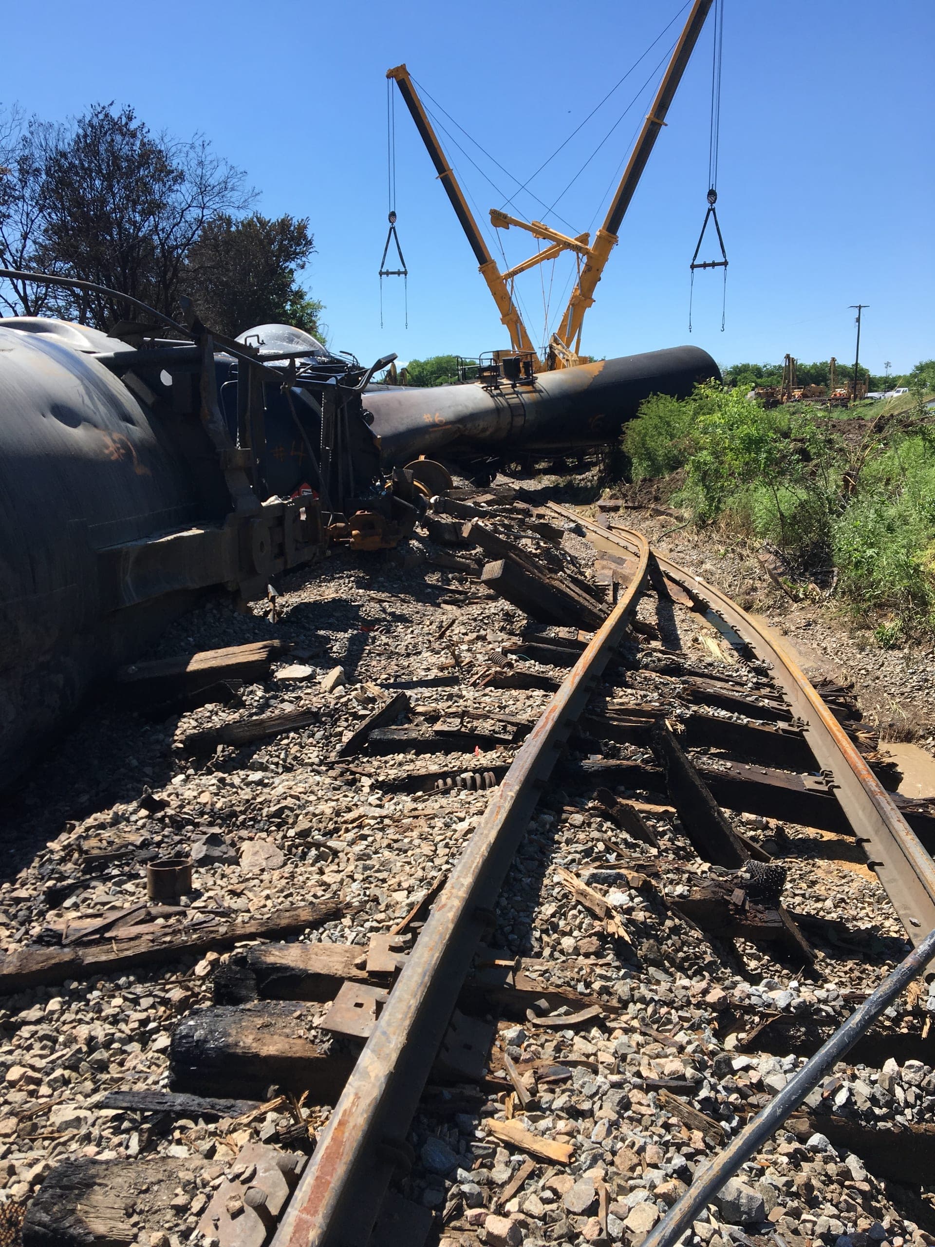 Aftermath of a Union Pacific ethanol-tank-car derailment showing damaged tank cars and destroyed track in Fort Worth, Texas.