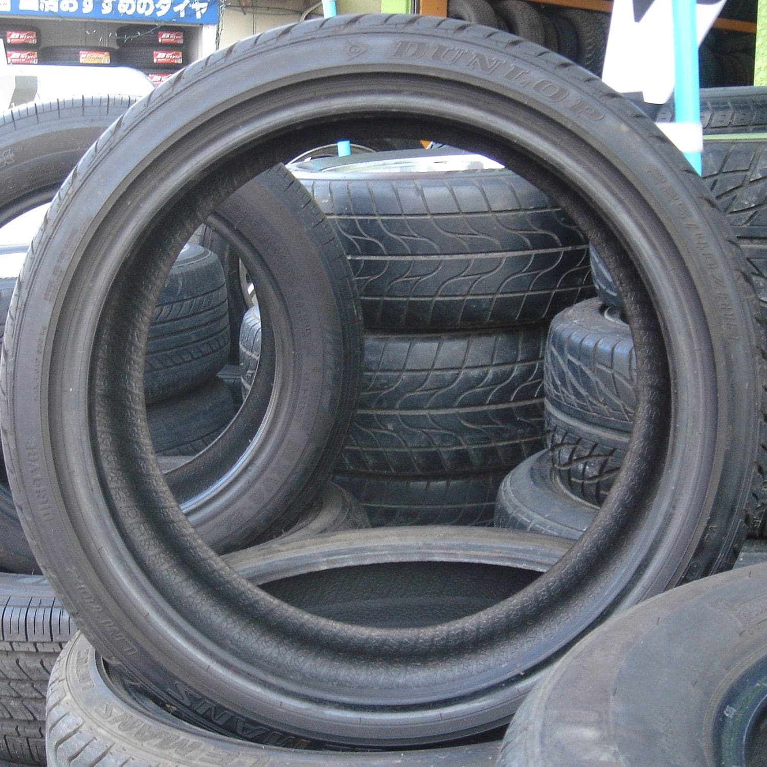 Stacked vehicle tires — representative photo for NHTSA tire/wheel recall