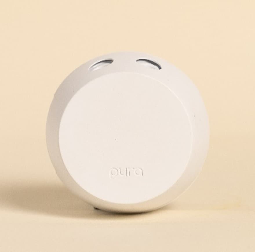 Recalled Pura 4 Smart Home Fragrance Diffusers with detachable covers